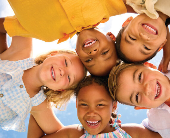 Group of Smiling Kids in the Summer