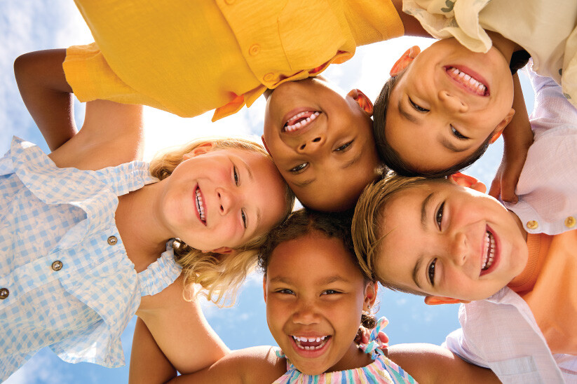 Group of Smiling Kids in the Summer